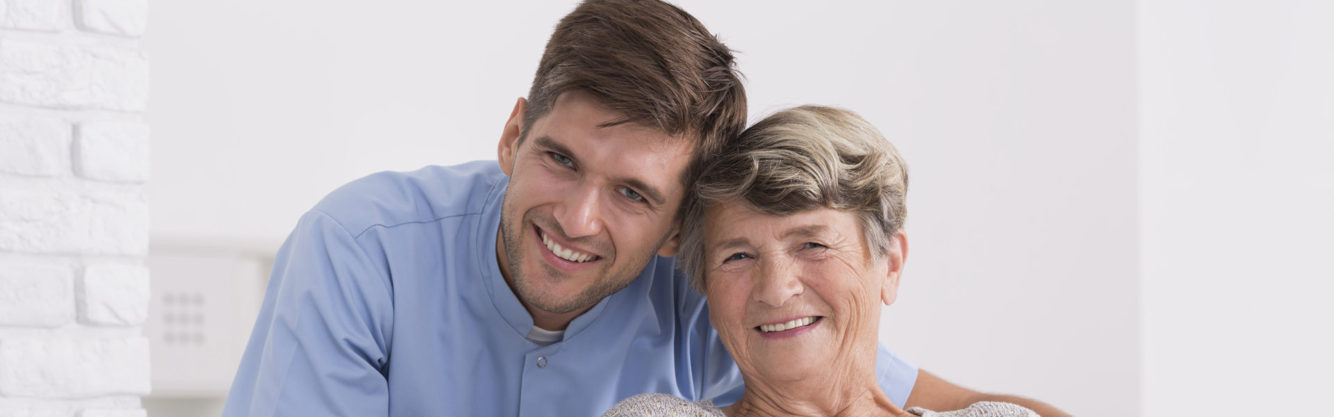 nurse and elderly smiling